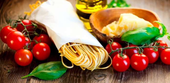 Pasta. Italian Homemade Spaghetti with Parmesan and tomatoes