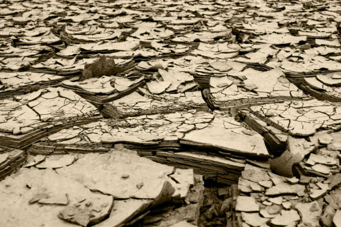 dried mud and river silt following huge floods queensland