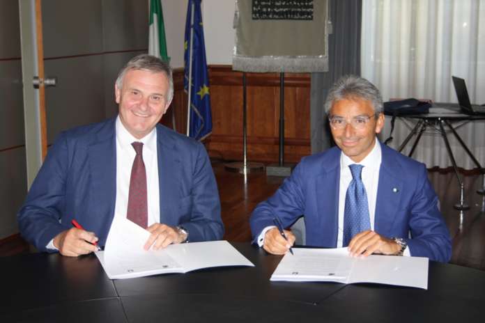 università