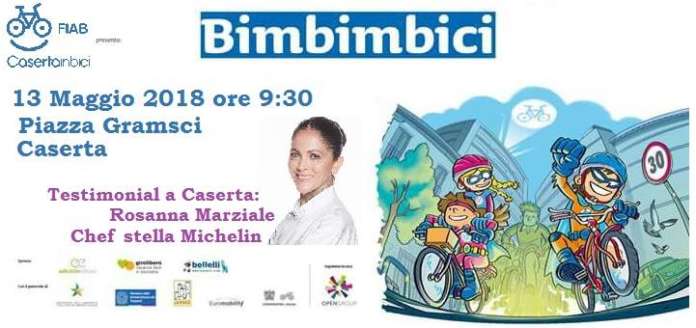 bimbi in bici