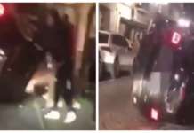 Ragazzini in strada di notte capovolgono un’auto in sosta (VIDEO)