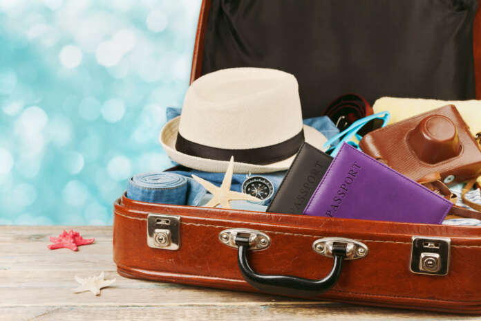 Packed,Vintage,Suitcase,For,Summer,Holidays,,Vacation,,Travel,And,Trip.