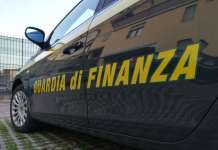 Centinaia di paia di scarpe sequestrate donate alla onlus di don Merola